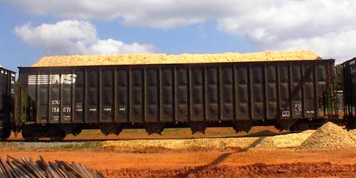 Freight car half flung, half free fall loaded
